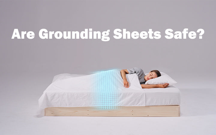 Person sleeping with conductive grounding sheets that connect to Earth's electrical field for better sleep.