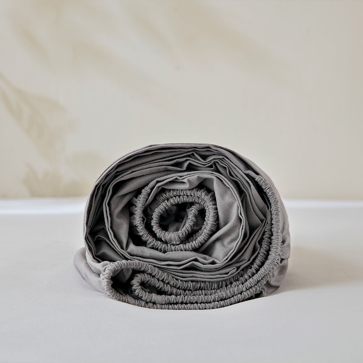 Rolled grounding bamboo fitted sheet, grey color